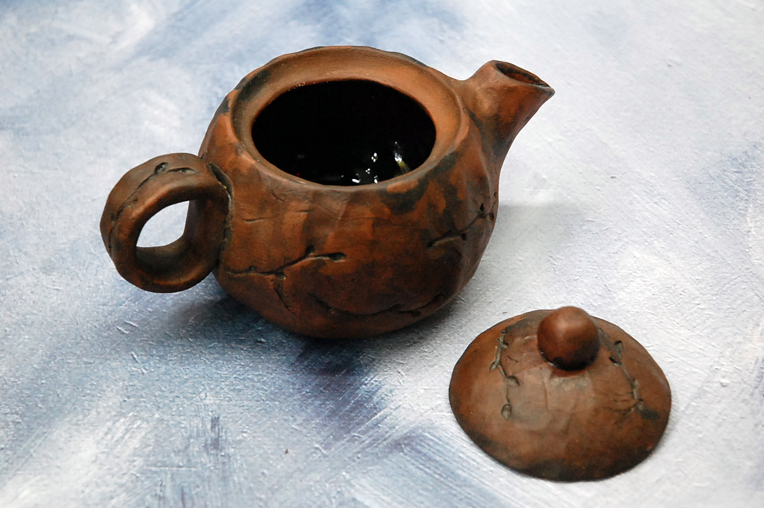 Spring pottery clay tea brewing pot or teapot for tea ceremony